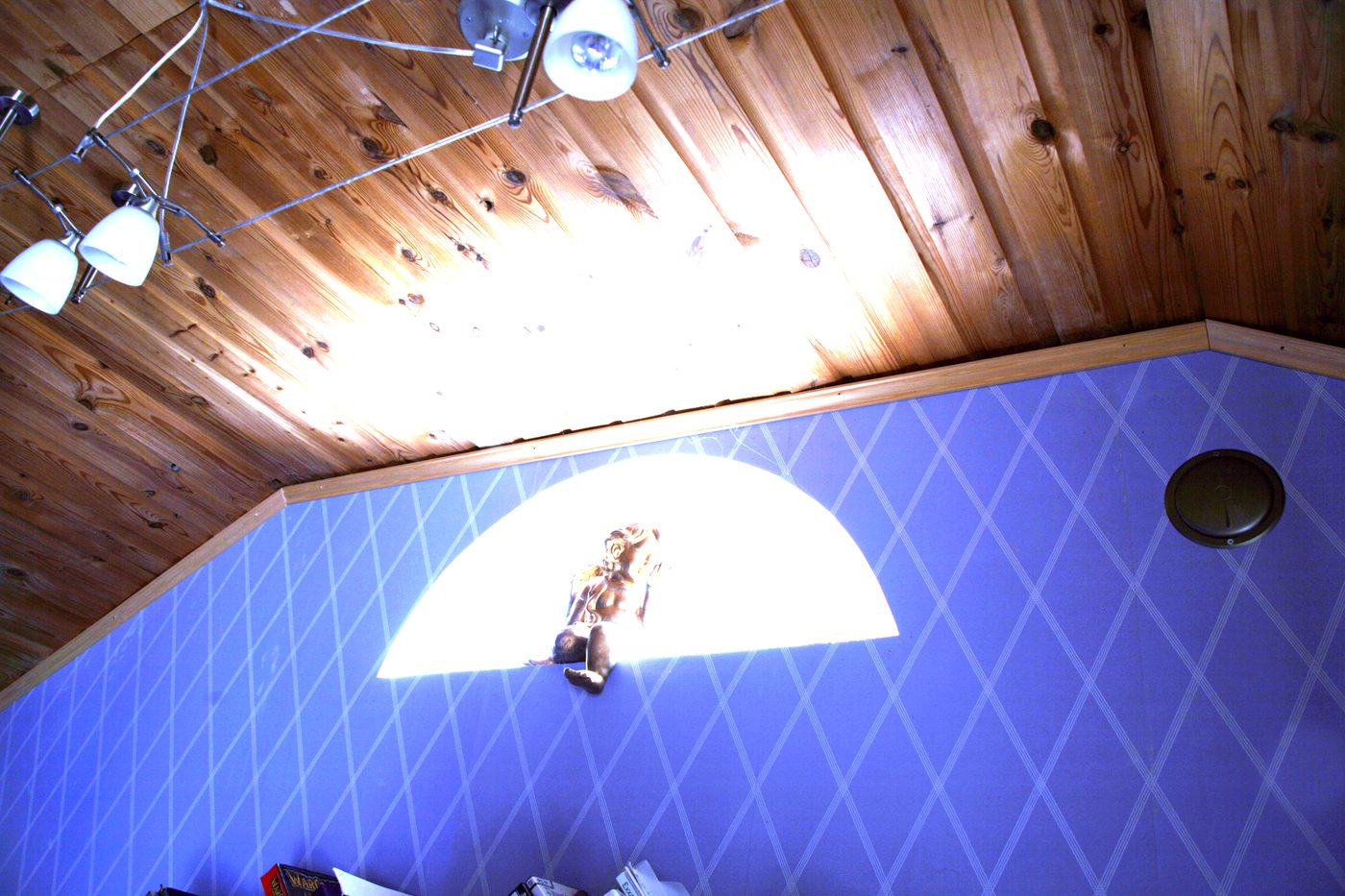 Bedroom nook under the timber ceiling